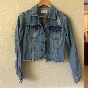 Distressed denim jacket